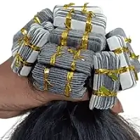 Tape-in human hair extensions